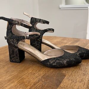 Black and gold heels